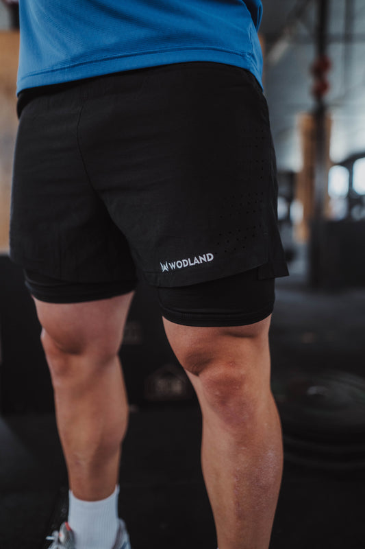 SHORTS CON MALLA 2 EN 1 NEGRO